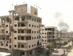 Сирийские боевики с семьями уезжают из Дарайи