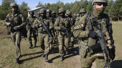 Военный контингент НАТО в Польше будет увеличен вдвое Военный контингент НАТО в Польше будет увеличен вдвое
