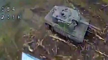 Leopard 2A4 с советской "реактивной броней" добили дроном и двумя ПТУР