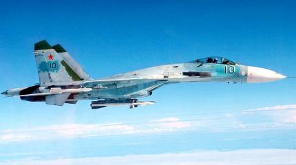 Российский Су-27 пролетел в полутора метрах от американского самолета Российский Су-27 пролетел в полутора метрах от американского самолета