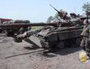 Украинские силовики начали использовать танки в боях возле Славянска Украинские силовики начали использовать танки в боях возле Славянска