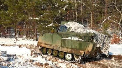 Необычный БТР с остекленной кабиной заметили на одном из полигонов ВСУ