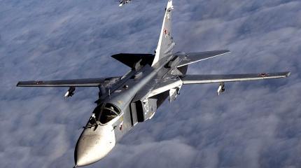 Российские бомбардировщики Су-24 возвращаются из Сирии Российские бомбардировщики Су-24 возвращаются из Сирии