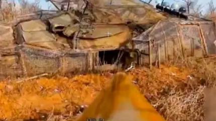 Появилось видео ударов FPV-дронов и "Ланцета" по БТР М1117 из США