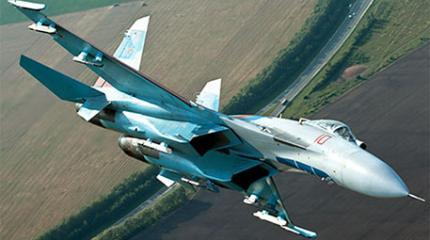 Российский Су-27 пролетел в семи метрах от самолета ВВС США Российский Су-27 пролетел в семи метрах от самолета ВВС США
