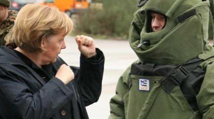 Ангела Меркель берёт курс на милитаризацию Ангела Меркель берёт курс на милитаризацию