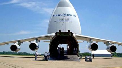 Ан-124 "Руслан" перебросил боевые вертолеты на авиабазу РФ в Киргизии Ан-124 "Руслан" перебросил боевые вертолеты на авиабазу РФ в Киргизии