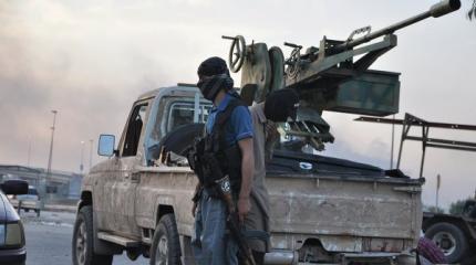 Боевики ИГ устроили между собой перестрелку в сирийской Ракке Боевики ИГ устроили между собой перестрелку в сирийской Ракке