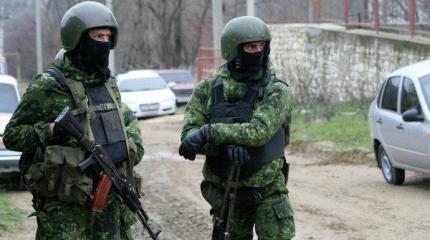 Силовики блокировали жилой дом в Махачкале, введен режим КТО Силовики блокировали жилой дом в Махачкале, введен режим КТО