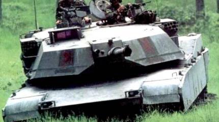 Американские танки в Европе начали срочно перекрашивать в зеленый Американские танки в Европе начали срочно перекрашивать в зеленый