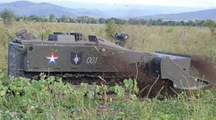 Боевые роботы «Уран» вооружили противотанковой «Атакой» Боевые роботы «Уран» вооружили противотанковой «Атакой»