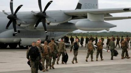 Губернатор Окинавы "послал" США с его военными базами Губернатор Окинавы "послал" США с его военными базами