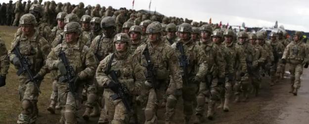 НАТО готовится к войне с Россией и путает след