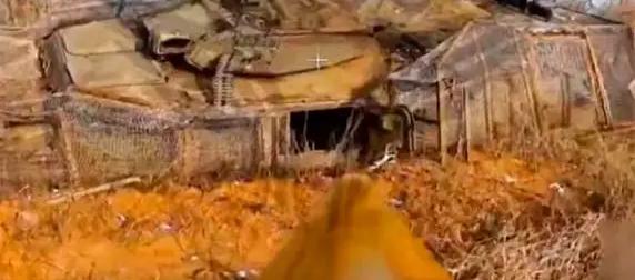 Появилось видео ударов FPV-дронов и "Ланцета" по БТР М1117 из США