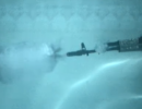 Автомат Калашникова в замедленной подводной съемке
