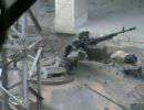 Дарайя. Сирийский повстанец обстреливает танк