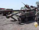 Украинские силовики начали использовать танки в боях возле Славянска Украинские силовики начали использовать танки в боях возле Славянска