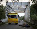 Два автобуса с украинскими беженцами обстреляли у границы с Россией