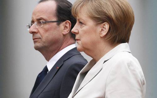 Меркель и Олланд высказались против оказания военной помощи Украине