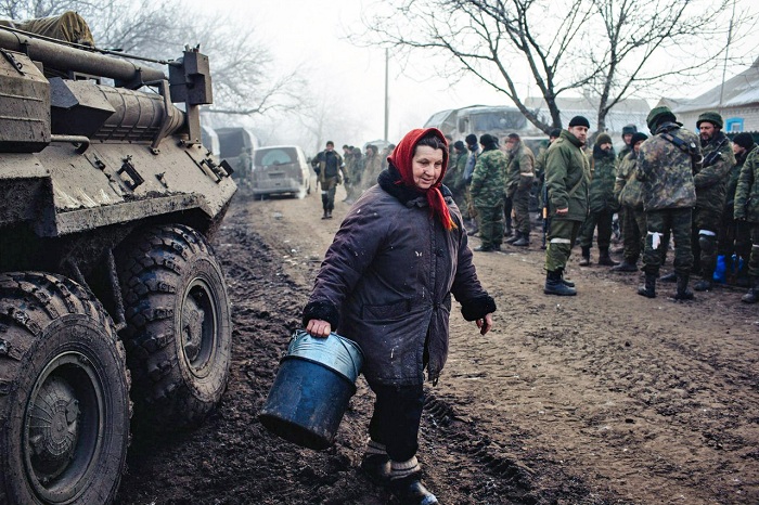 Привычка к войне: почему мирные жители не покидают Донбасс
