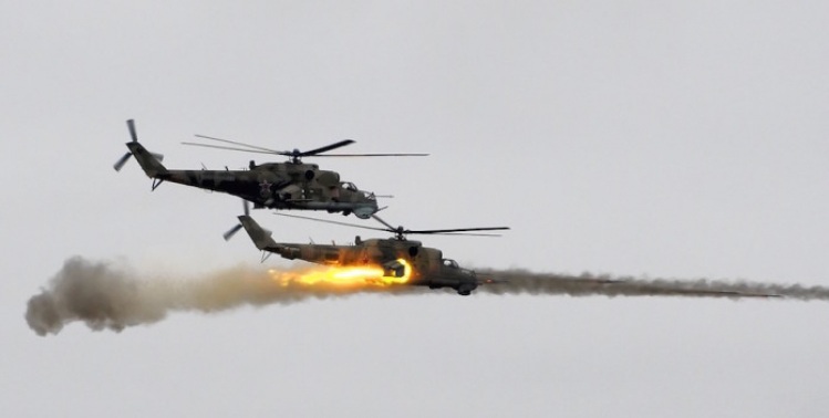 Сирийские вертолеты сбросили бочковые бомбы на головы исламистов