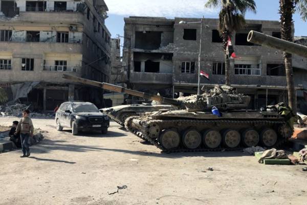 Сирия: боевики покидают Харасту, угроза провокаций сохраняется