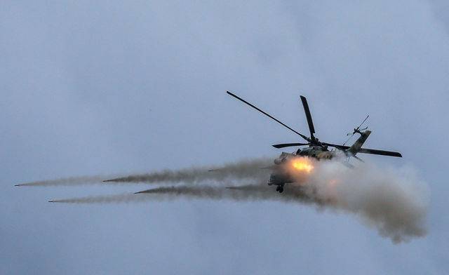 Военно воздушная операция. Ми-24 ведет огонь.