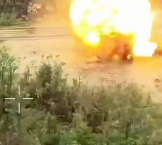 Мощный взрыв отбросил горящие останки броневика ВСУ на десятки метров